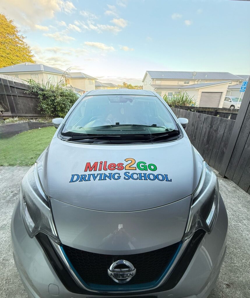 Miles2go Driving School logo