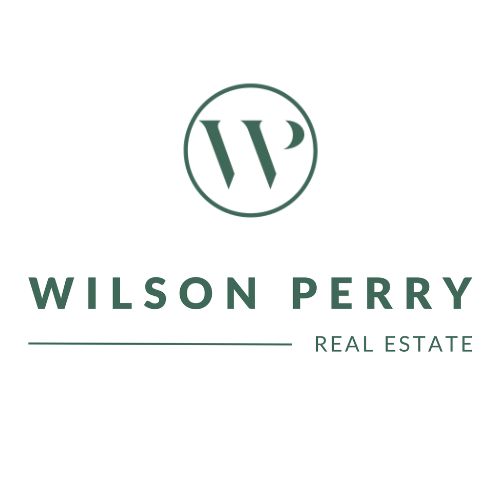 Wilson Perry Real Estate logo